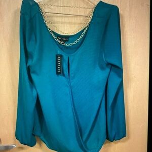 Metaphor shirt with necklace built in.